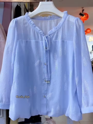 Light Blue Sheer Blouse with Leaf Pattern and Pearl Buttons