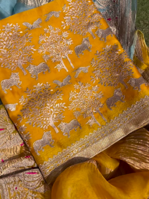 Golden Yellow Fabric with Woven Forest and Animal Motifs